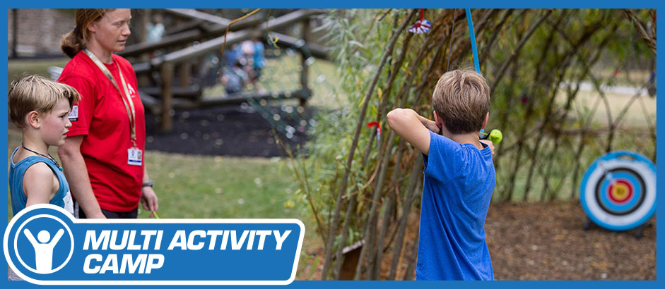 Multi-activity camp. Child with bow and arrow.
